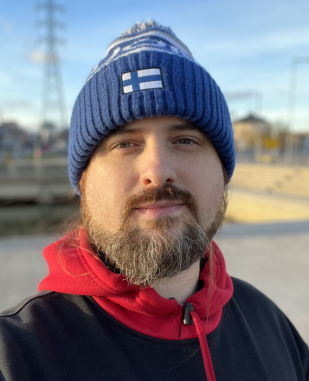 Profile Picture of Adrián Moreno (@zetxek), working side by side with a colleague: sitting on a desk, while looking at a screen